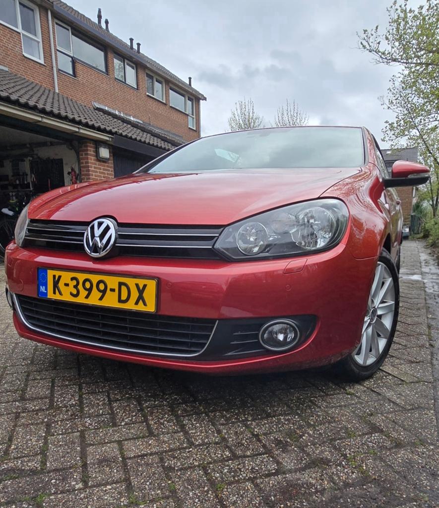 Volkswagen Golf 1.2 TSI 77KW BMT Cabrio 2011 Rood, Auto's, Volkswagen, Voorwielaandrijving, 1321 kg, Zwart, 4 cilinders