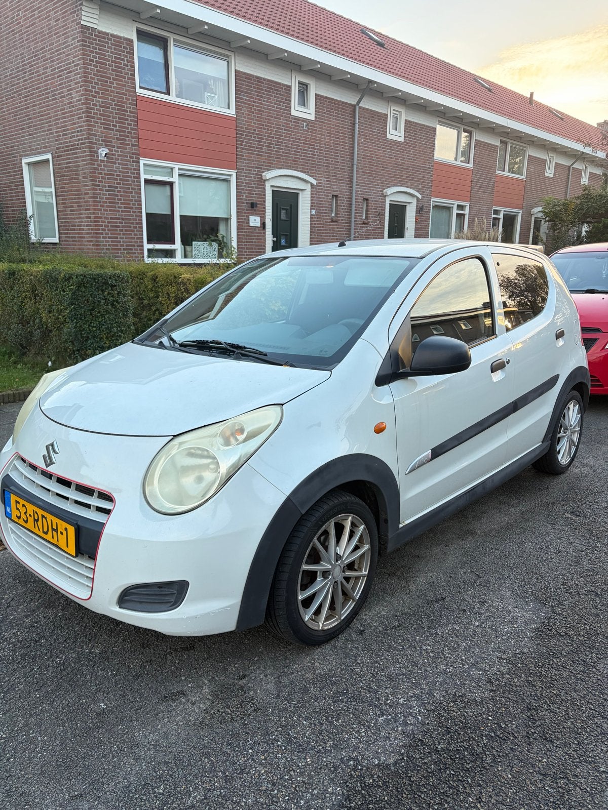 Suzuki Alto 1.0 2011 Wit, Auto's, Voorwielaandrijving, Bluetooth, Stof, 4 stoelen