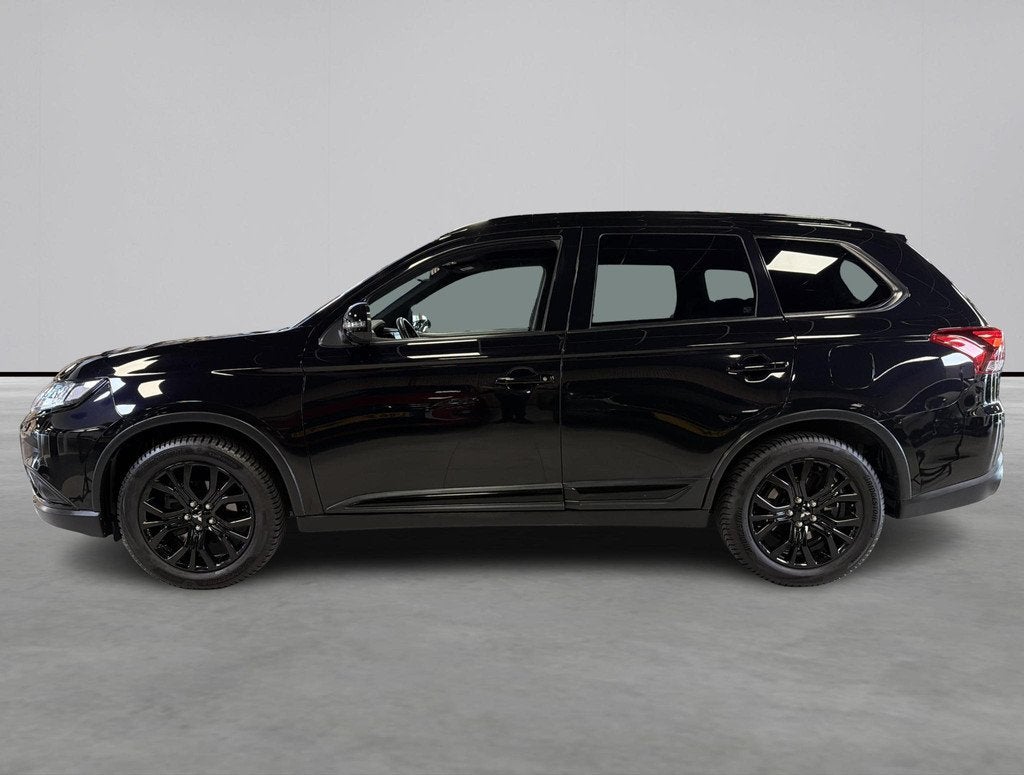 Mitsubishi Outlander 2.0 Black edition 7 persoons, Trekhaak,, Auto's, Mitsubishi, 1998 cc, Stof, Euro 6, 4 cilinders