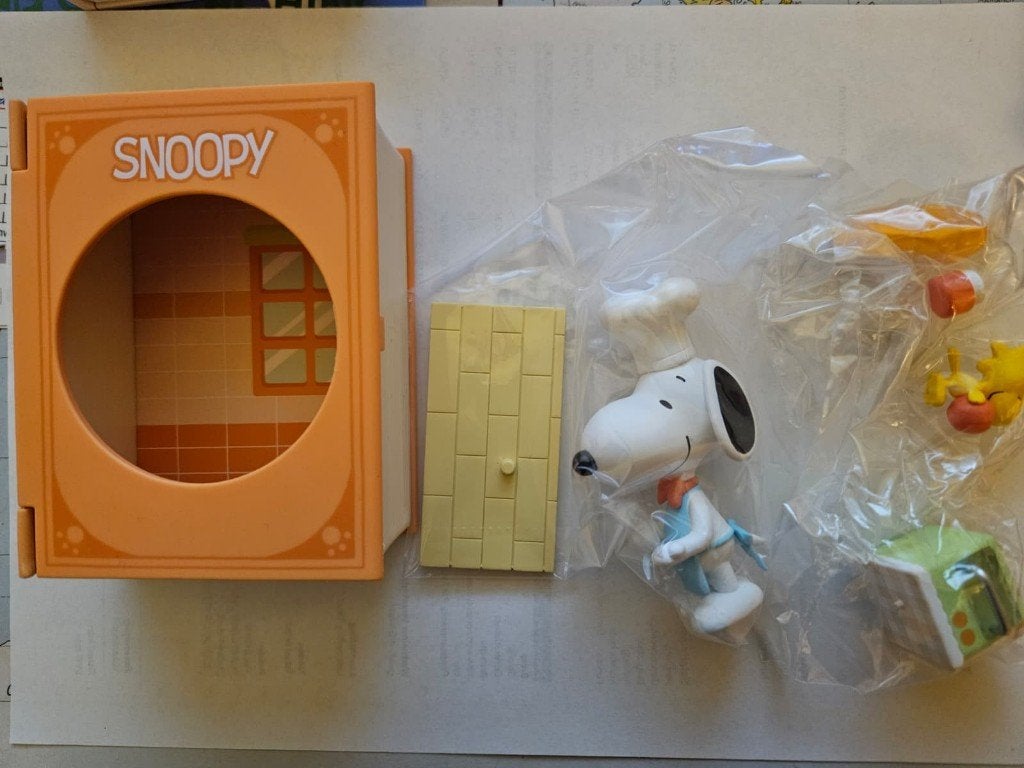 Snoopy als kok (in boekje), Ophalen of Verzenden, Snoopy, Nieuw, Beeldje of Figuurtje