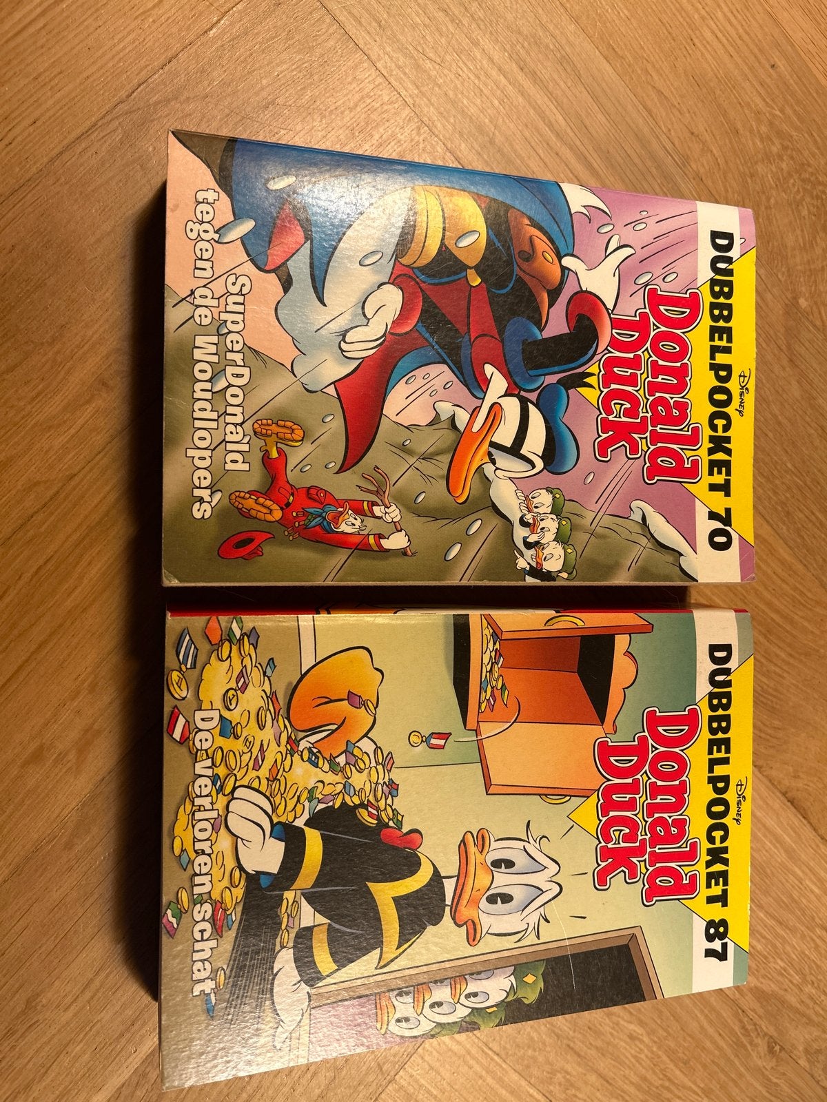 Donald Duck Dubbelpocket 70 & 87 - SuperDonald & De Schat, Meerdere stripboeken, Ophalen of Verzenden, Gelezen