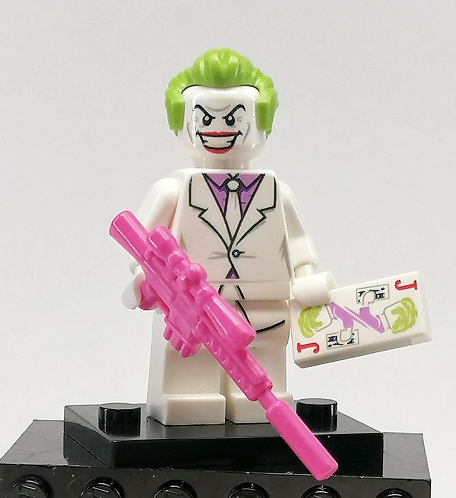 Lego minifiguur Joker met geweer € 3,50, Verzenden, Lego, Zo goed als nieuw, Minifiguur