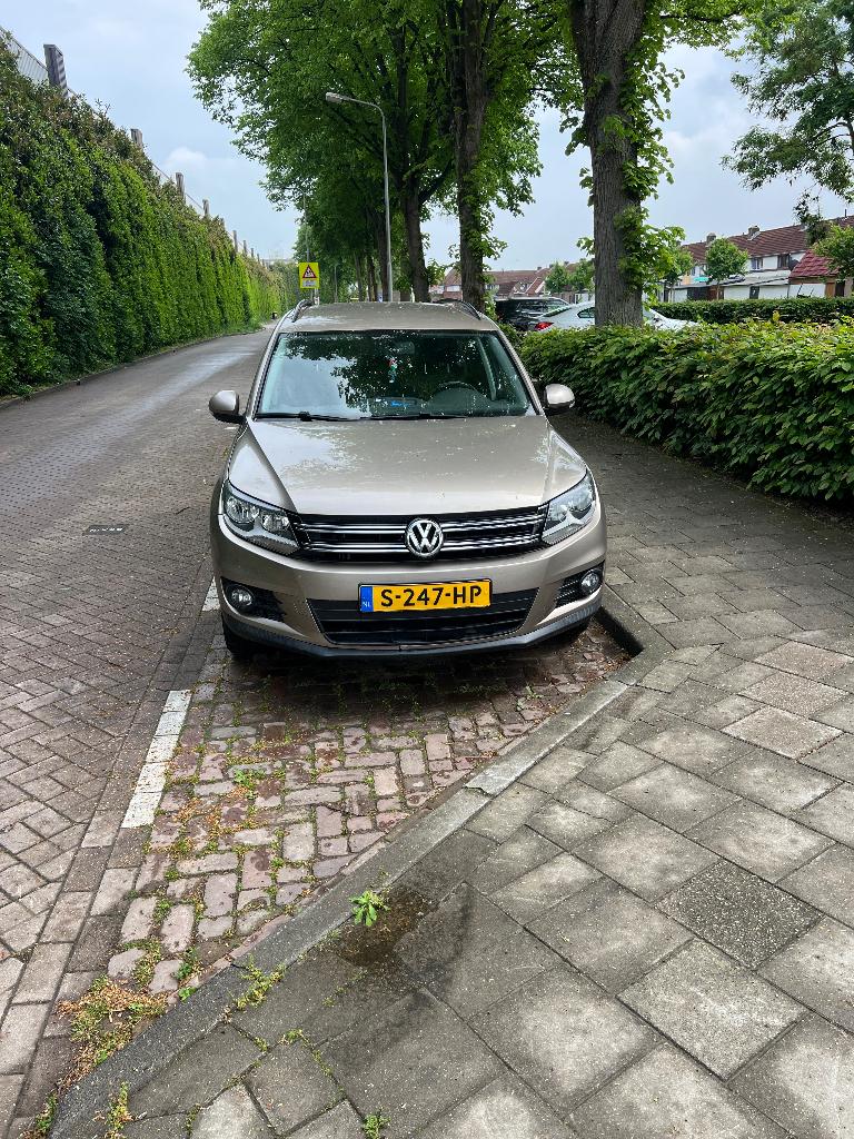 Volkswagen Tiguan 1.4 TSI 90KW BMT 2014 Geel, Voorwielaandrijving, Euro 5, 122 pk, Handgeschakeld