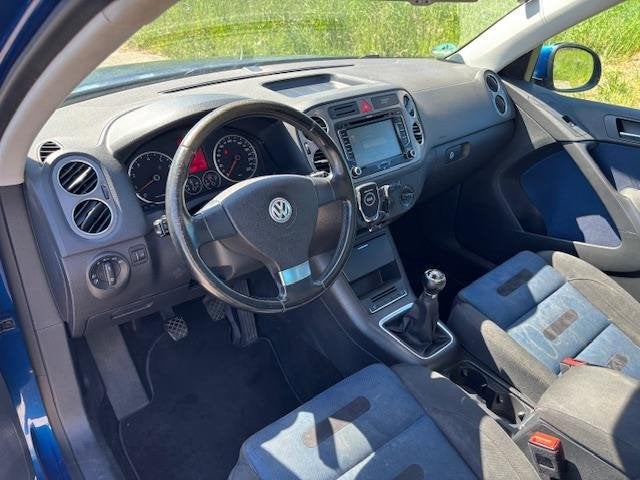 Volkswagen Tiguan 1.4 TSI Trend&Fun 4Motion ECC Audio-CD/Nav, Auto's, 13 km/l, Stof, Gebruikt, Zwart