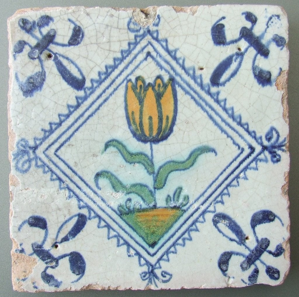 Antieke tegel met een Tulp in kwadraat., Antiek en Kunst, Verzenden