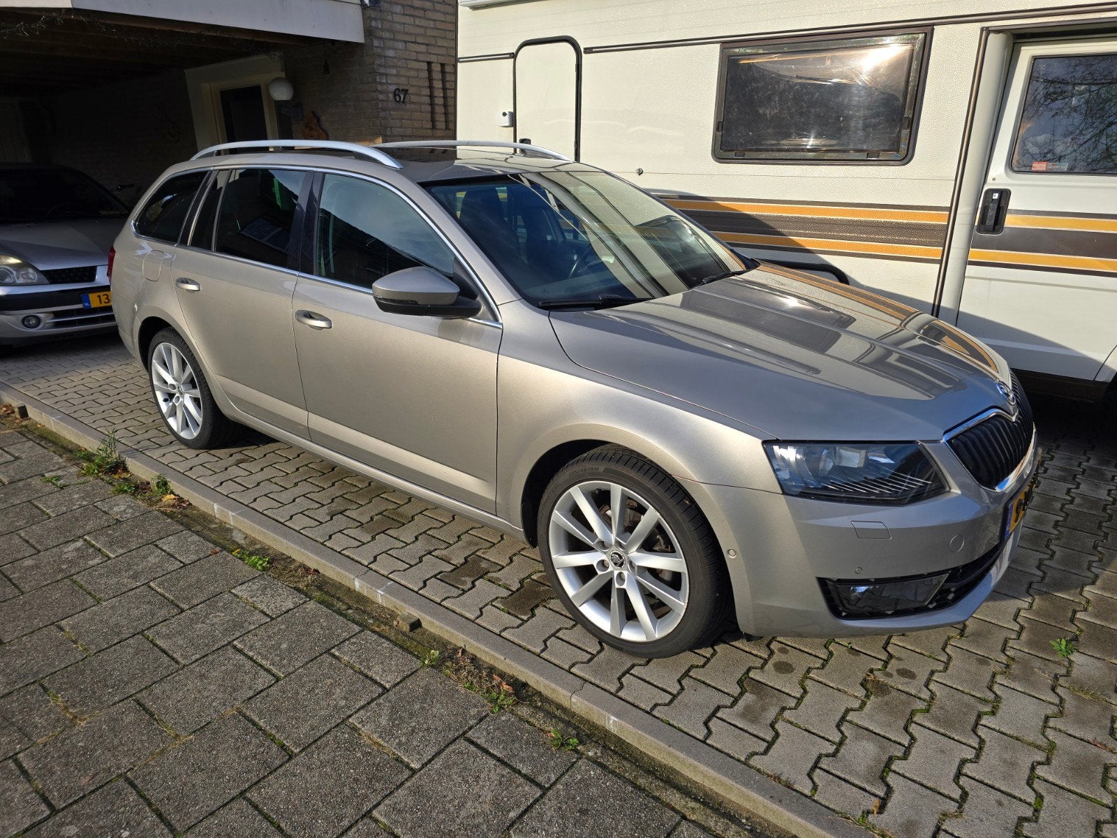 Skoda Octavia 1.2 TSI 77KW Comdi DSG 2014 Beige, Auto's, Stof, Zwart, 4 cilinders, Origineel Nederlands