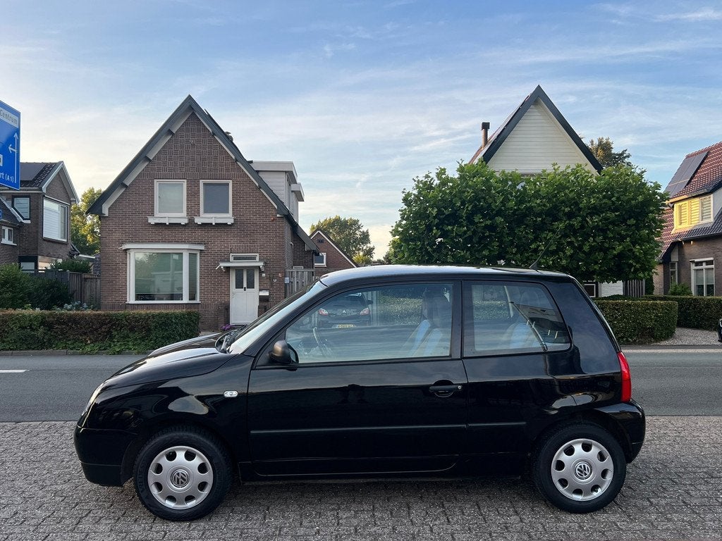Volkswagen Lupo 1.4 Trendline 125.000 km NL-AUTO-NAP, Voorwielaandrijving, Gebruikt, 4 cilinders, Zwart