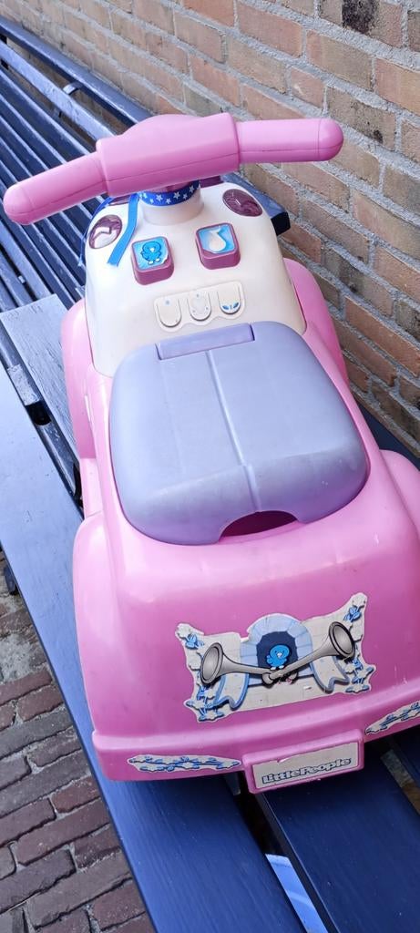 Roze loopauto Little People, Ophalen