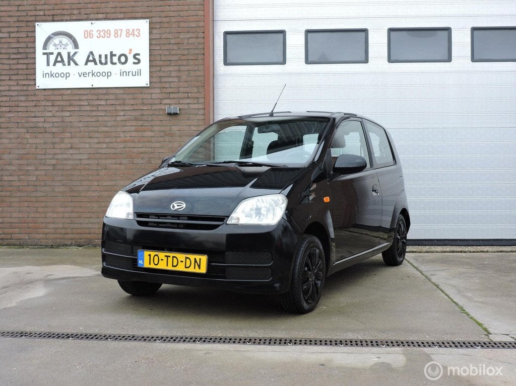 Daihatsu Cuore 1.0-12V Sporty/Airco/Stuurbekr/Trekhaak, Auto's, Daihatsu, 18 €/maand, Cuore, Zwart, Origineel Nederlands