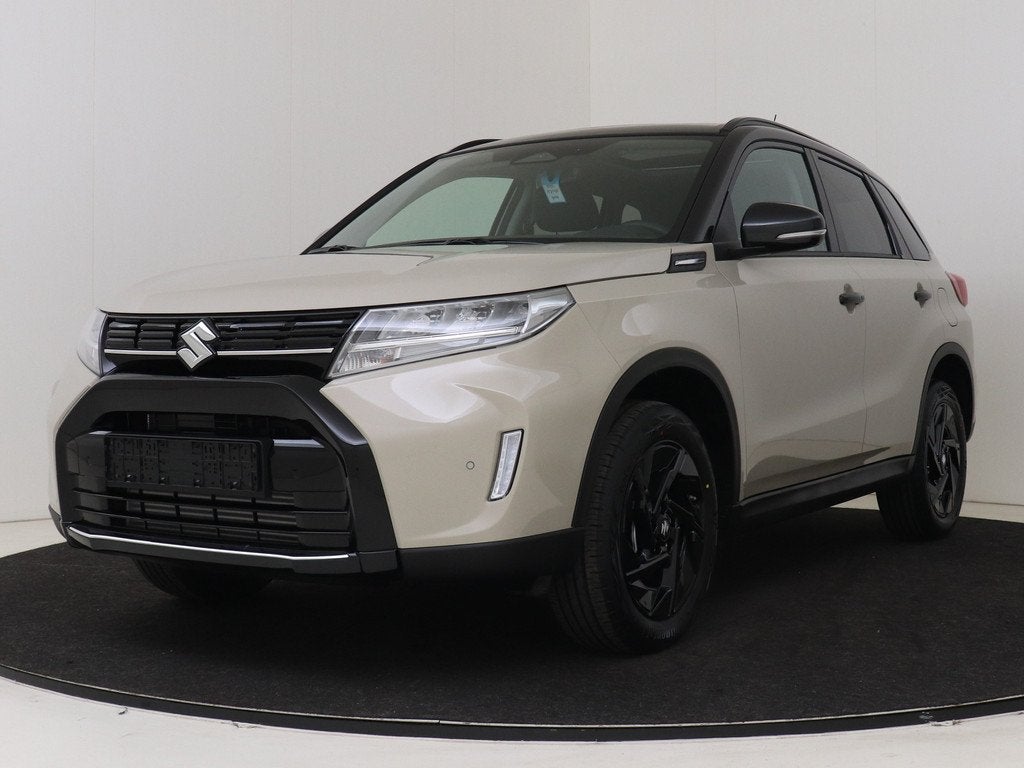 Suzuki Vitara 1.4 Boosterjet Smart Hybrid 60th Special Editi, Auto's, Suzuki, 12 maanden, Zwart, 4 cilinders, Beige