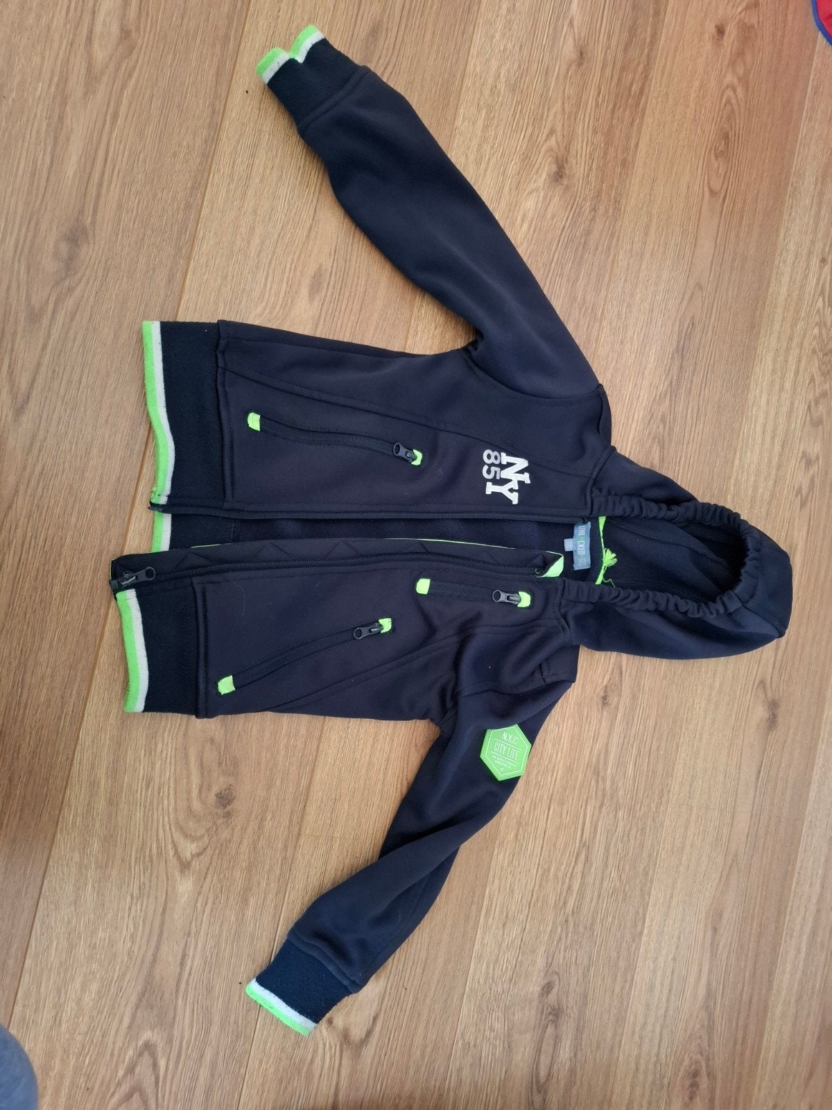 Stoere Unlocked! softshell jas maat 116/122, Gebruikt, Unlocked!, Ophalen of Verzenden, Jongen
