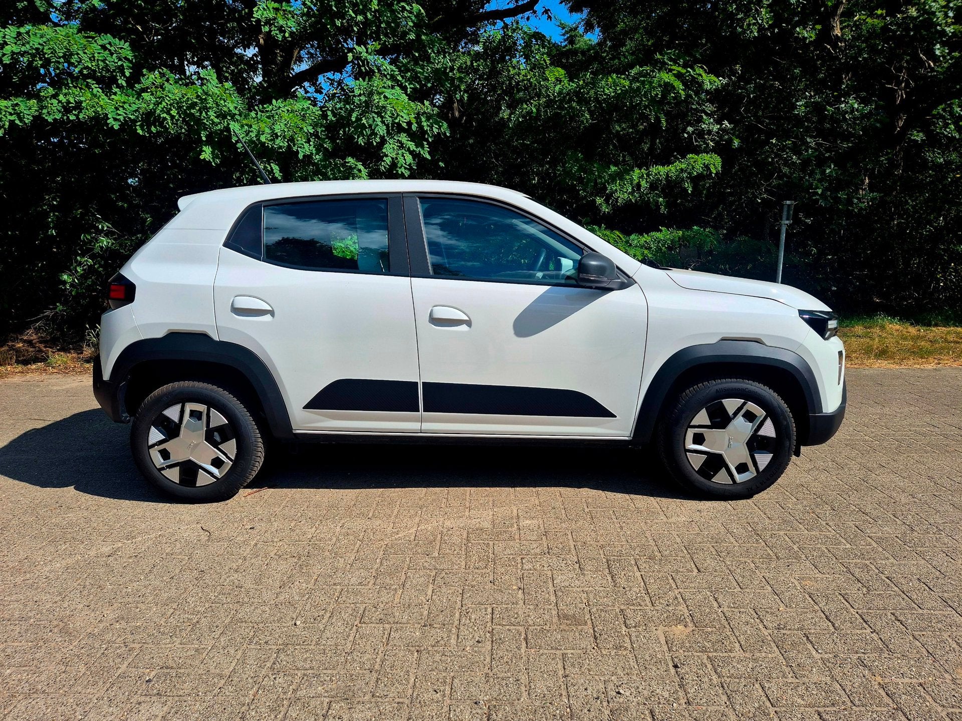 Dacia SPRING Expression 45 26.8 kWh, Stof, 4 stoelen, 45 pk, Nieuw