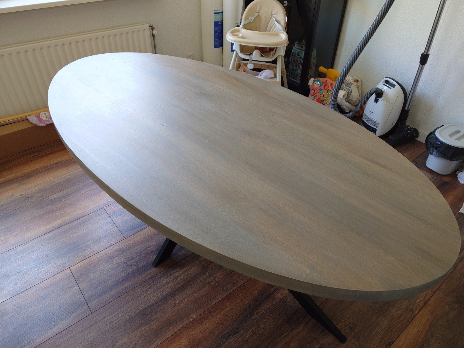 Ovalen grijze eikenhouten 6-persoons eettafel Goossens Blade, Ophalen, Gebruikt, 100 tot 150 cm, Modern, Industrieel