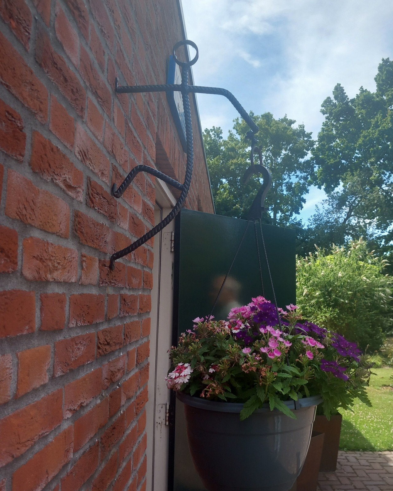 Unieke handgemaakte ijzeren bloempot hanger - speels figuur, Tuin en Terras, Bloempotten, Nieuw, Ophalen of Verzenden