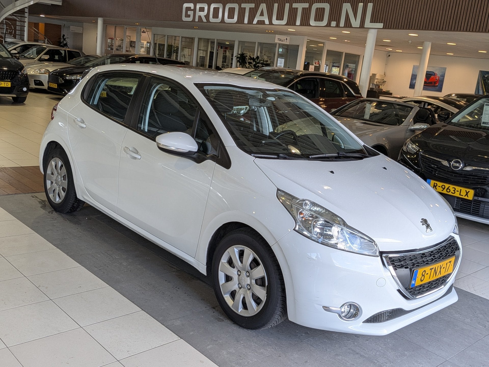 Peugeot 208 1.2 PureTech Blue Lease Dealer Onderhouden, Crui, Auto's, Peugeot, Euro 5, Stof, Gebruikt, Zwart