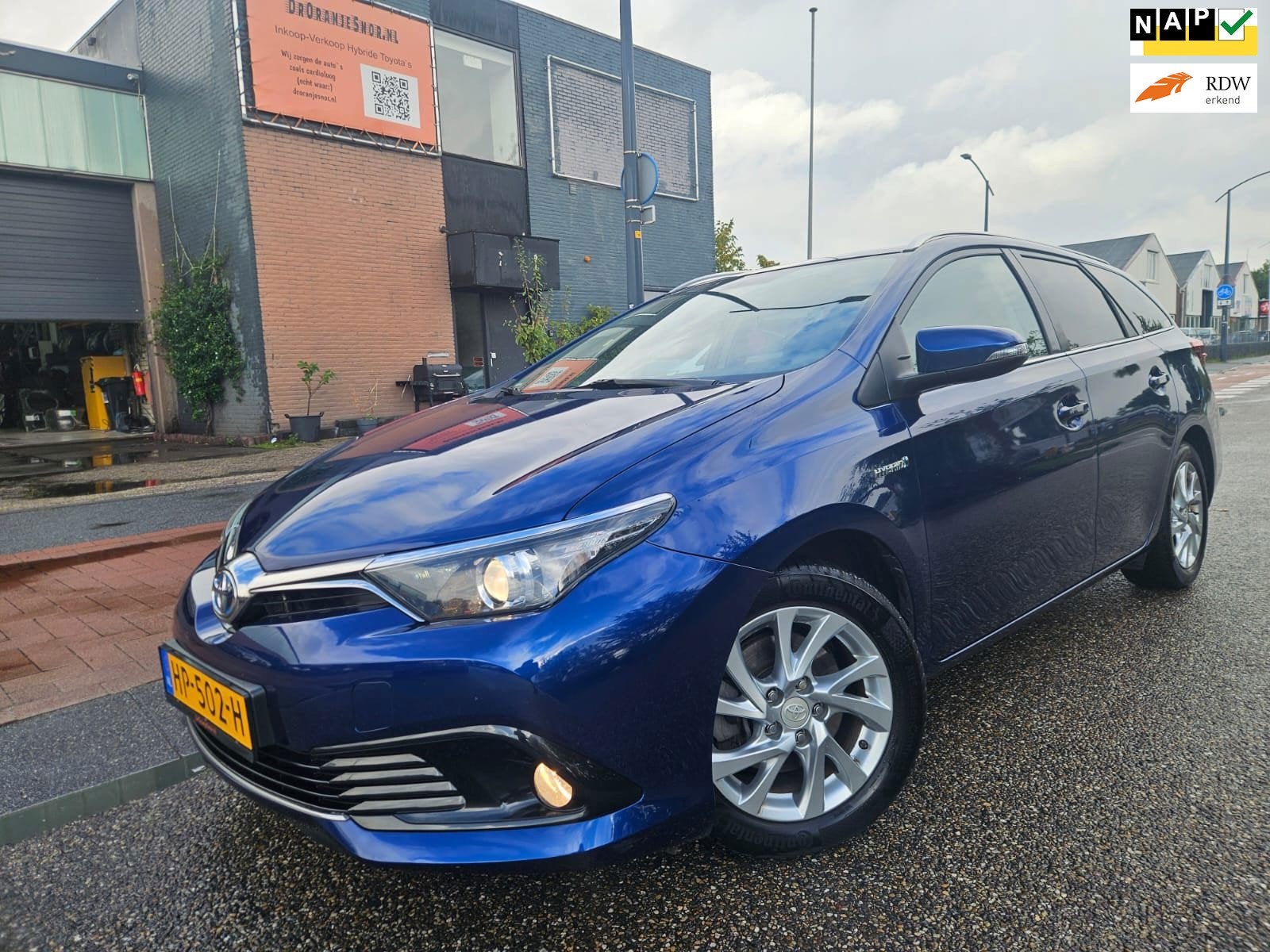 Toyota Auris 1.8 Hybrid Touring Sports Lease Pro GARANTIE, Auto's, Dealer onderhouden, 28 km/l, Gebruikt, Euro 6