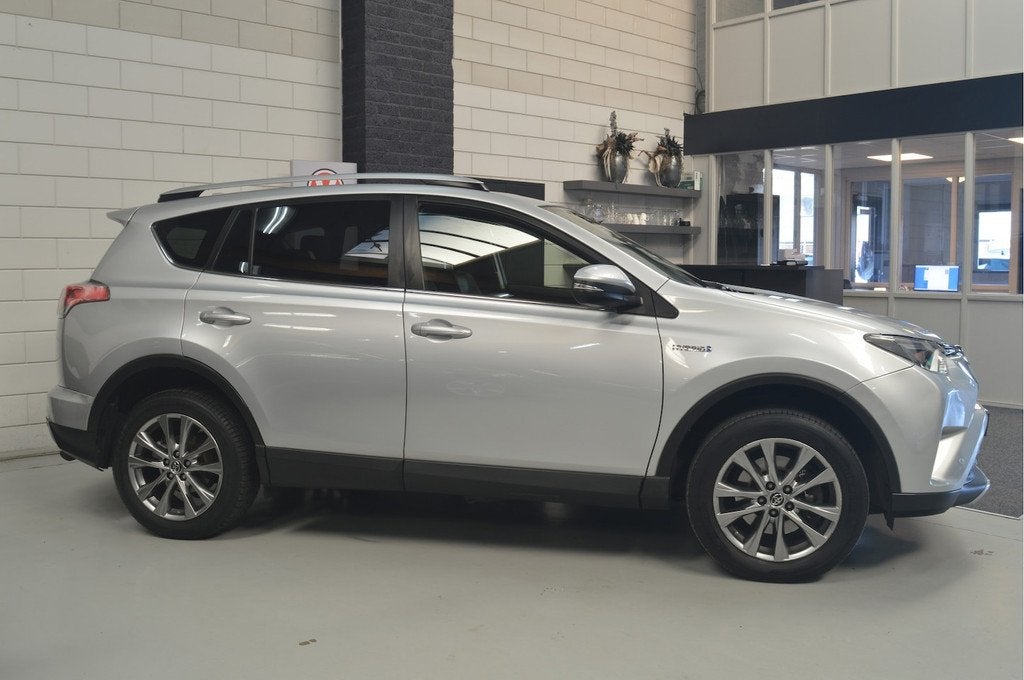 Toyota RAV4 2.5 Hybrid AWD Executive Business // LEDER // TR, Auto's, Toyota, Automaat, Automatische klimaatregeling, Gebruikt