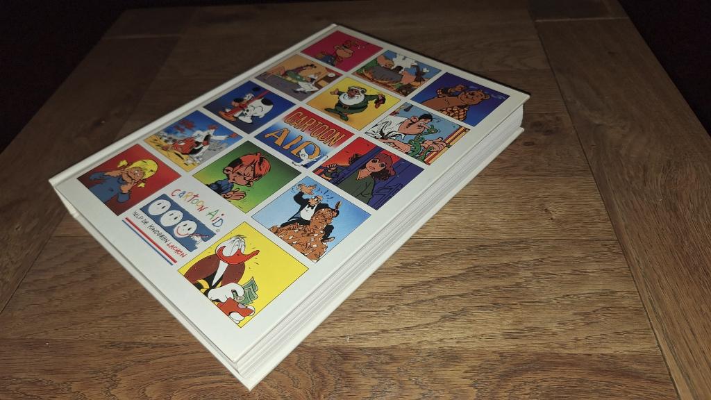 Cartoon Aid hardcover 1989, Boeken, Eén stripboek, Ophalen of Verzenden, Zo goed als nieuw, Diverse tekenaars en schrijvers