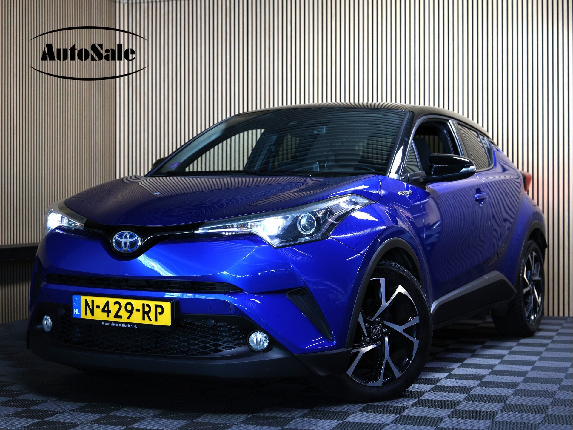 Toyota C-HR 1.8 Hybrid Business Ultimate NAVI CRUISE LANE CL, Auto's, Toyota, Euro 6, 4 cilinders, Blauw, Leder en Stof