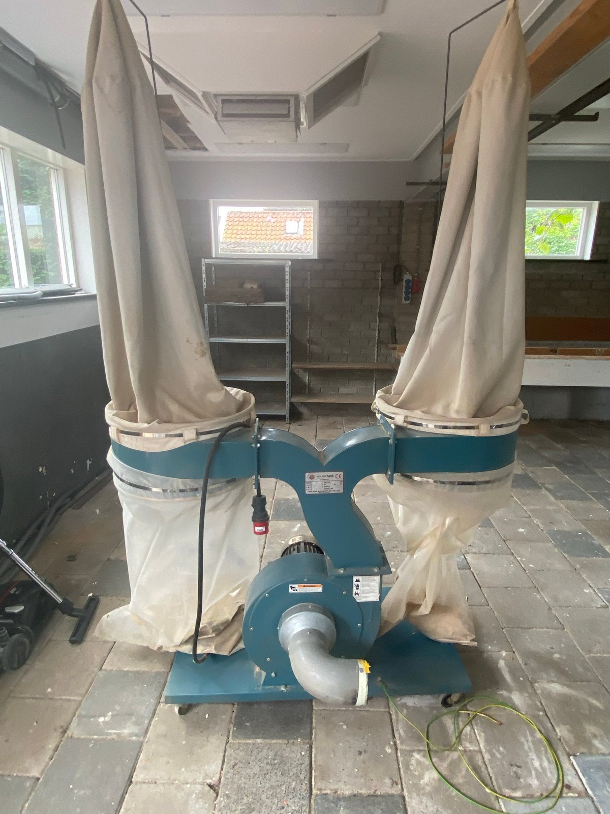 Robuuste afzuiginstallatie voor houtbewerking, Ophalen