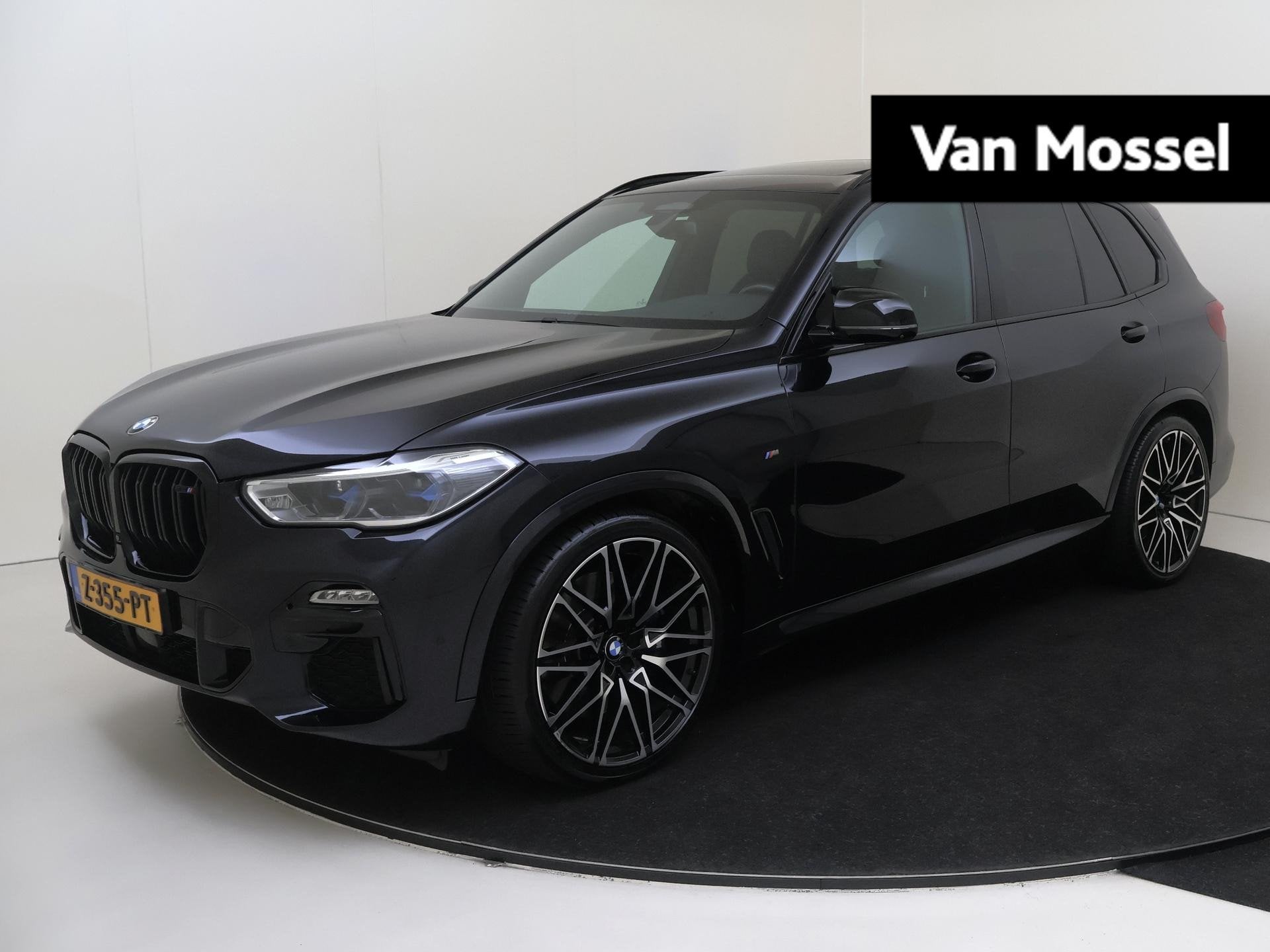 BMW X5 M50i High Executive 531 PK | airco automatisch | Appl, Automaat, Gebruikt, 4395 cc, Zwart