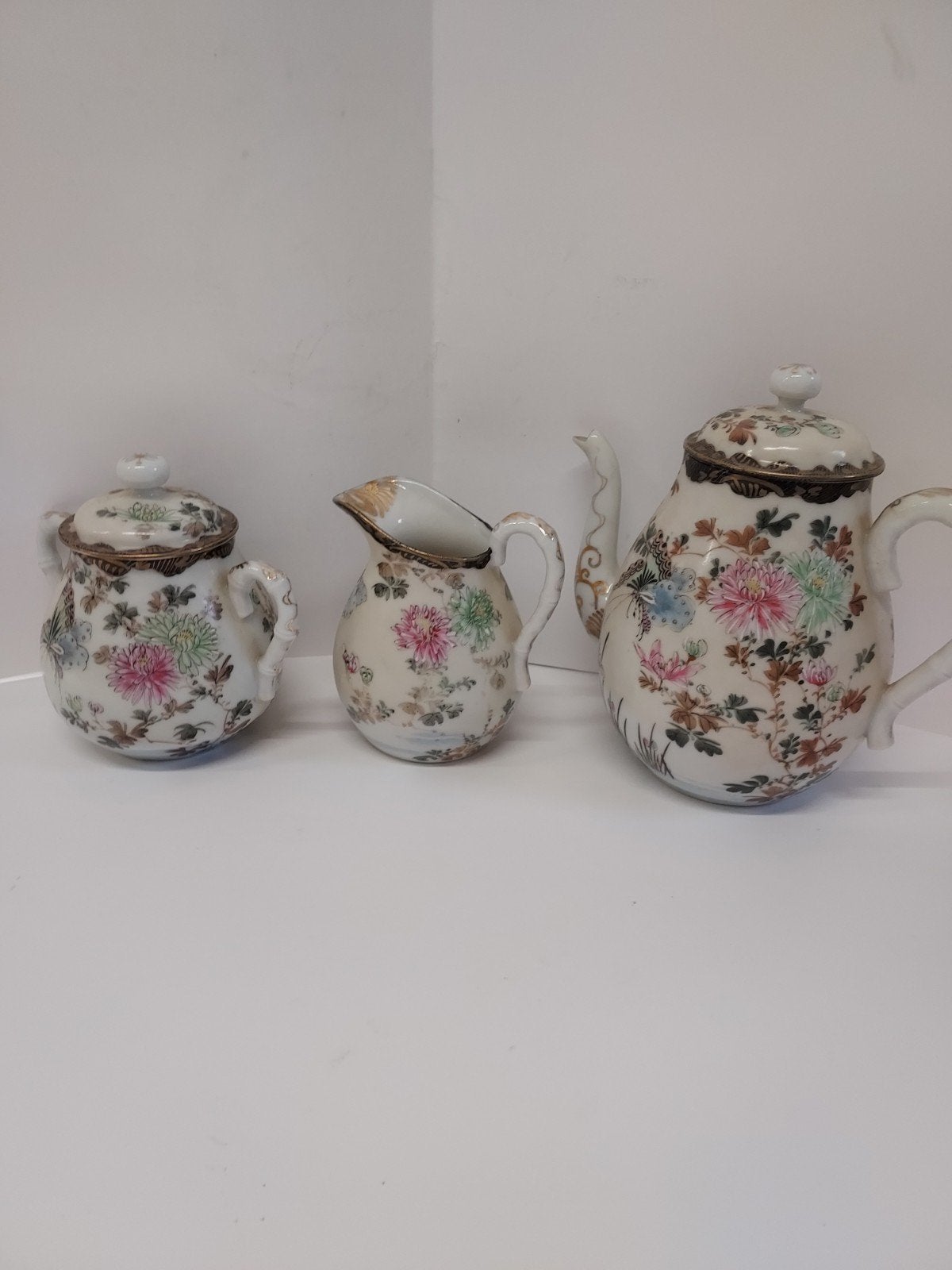 Antiek Japans theeservies met bloemmotief, Ophalen