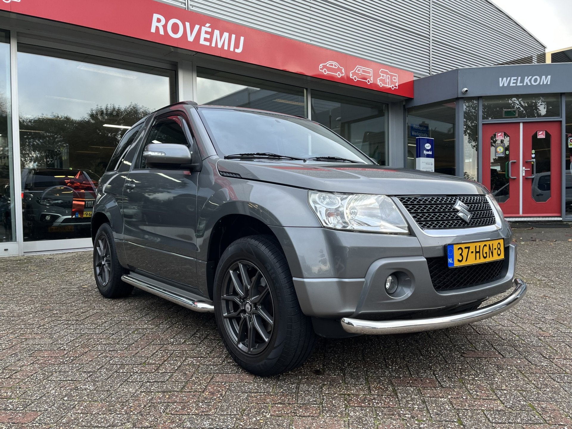 Suzuki Grand Vitara 2.4 Exclusive Clima, Stoelverwarming, Si, Stof, Gebruikt, Zwart, 4 cilinders