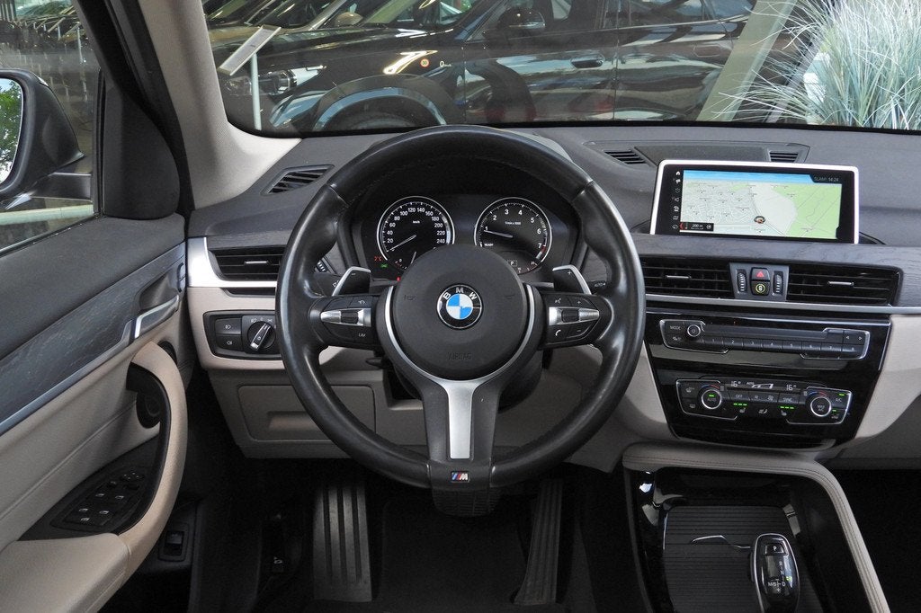BMW X1 sDrive20i High Executive Automaat / Panoramadak / Ada, 1998 cc, Euro 6, Bedrijf, Grijs