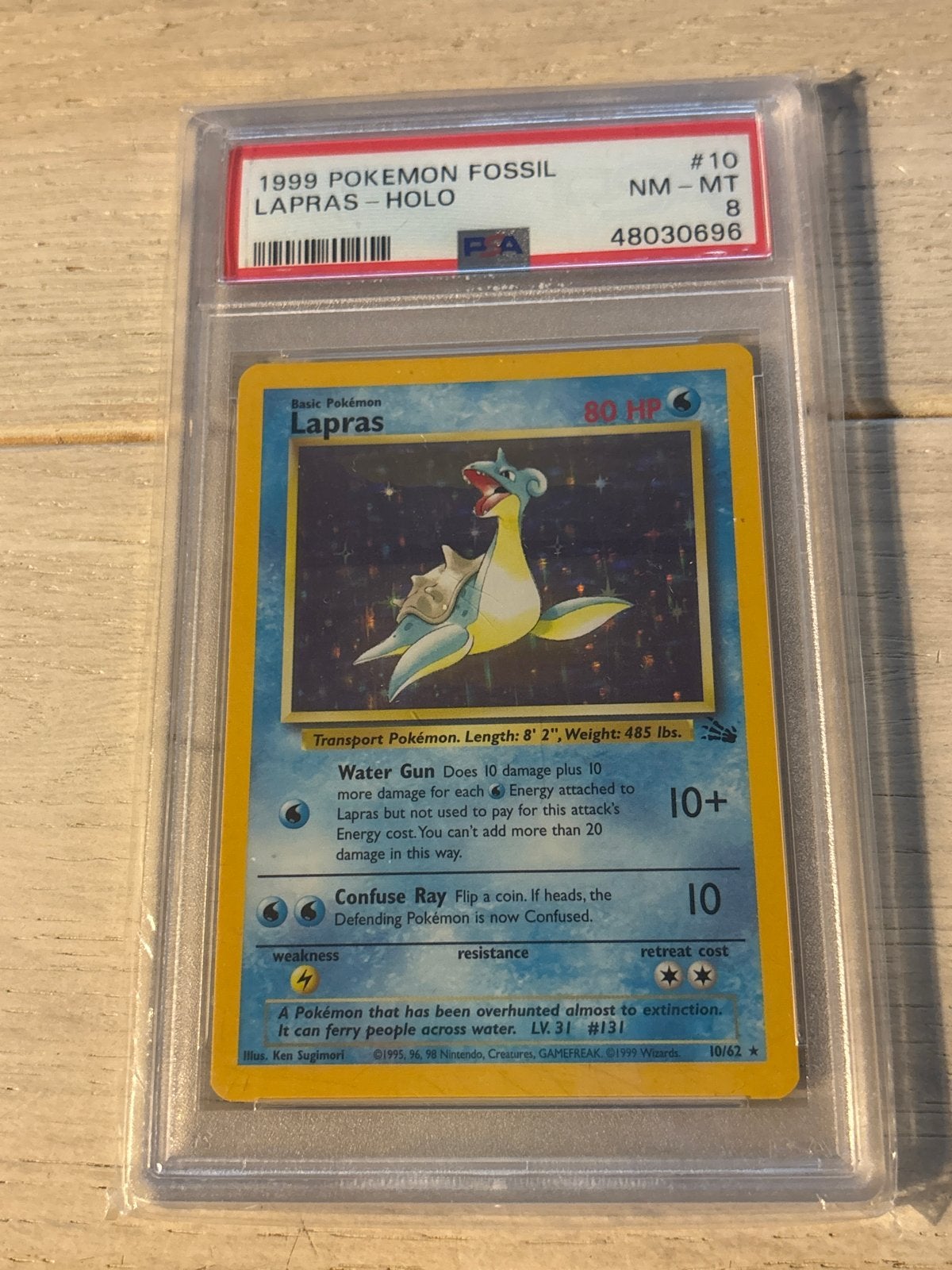 1999 Pokémon Fossil Lapras Holo #10 PSA 8 NM-MT, Ophalen of Verzenden, Zo goed als nieuw, Losse kaart, Foil