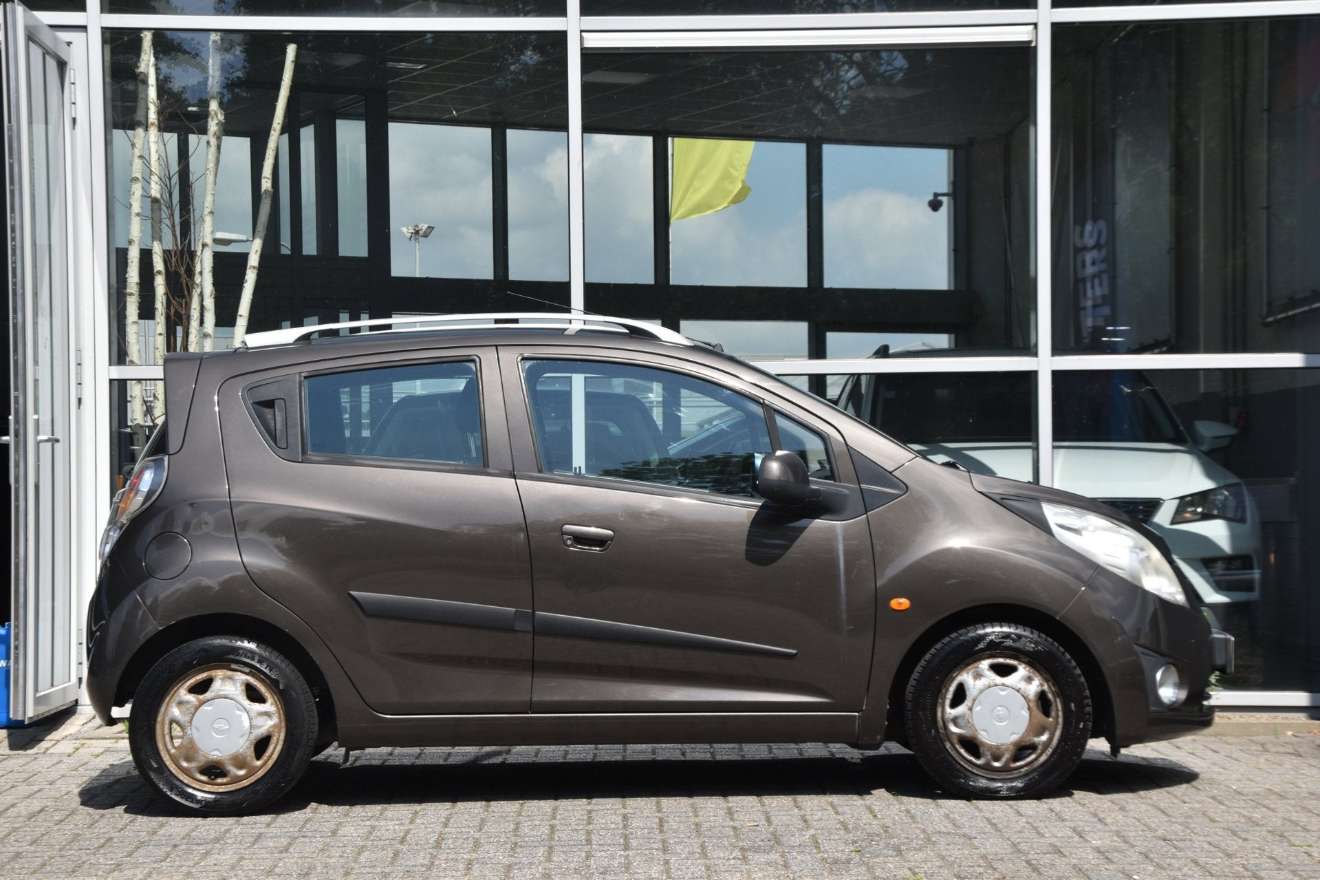 Chevrolet Spark 1.0 16V LS Bi-Fuel Airco Elek. Ramen 5drs. C, Auto's, Voorwielaandrijving, Euro 5, Stof, Zwart