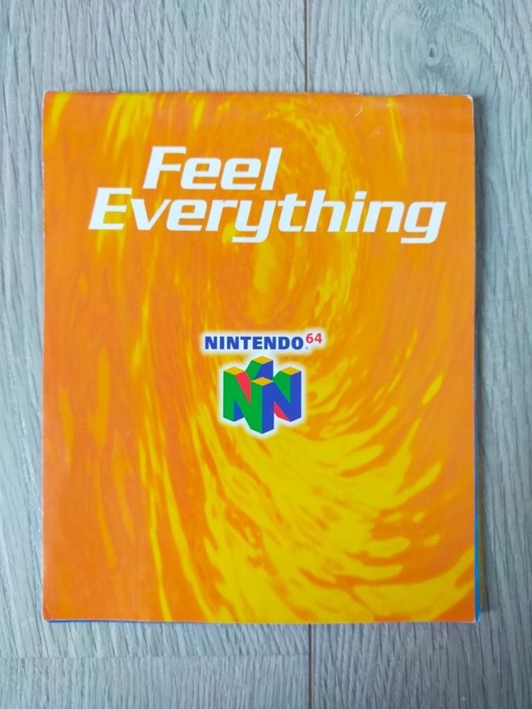 Vintage Nintendo 64 Promo Boekje - Feel Everything, Ophalen of Verzenden, Zo goed als nieuw, Zonder controller