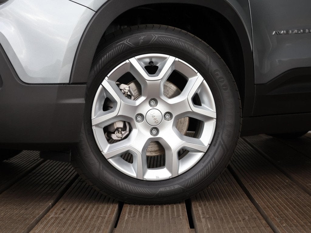 Jeep Avenger 1.2 e-Hybrid Altitude, Auto's, Jeep, Stof, Gebruikt, Euro 6, 1199 cc