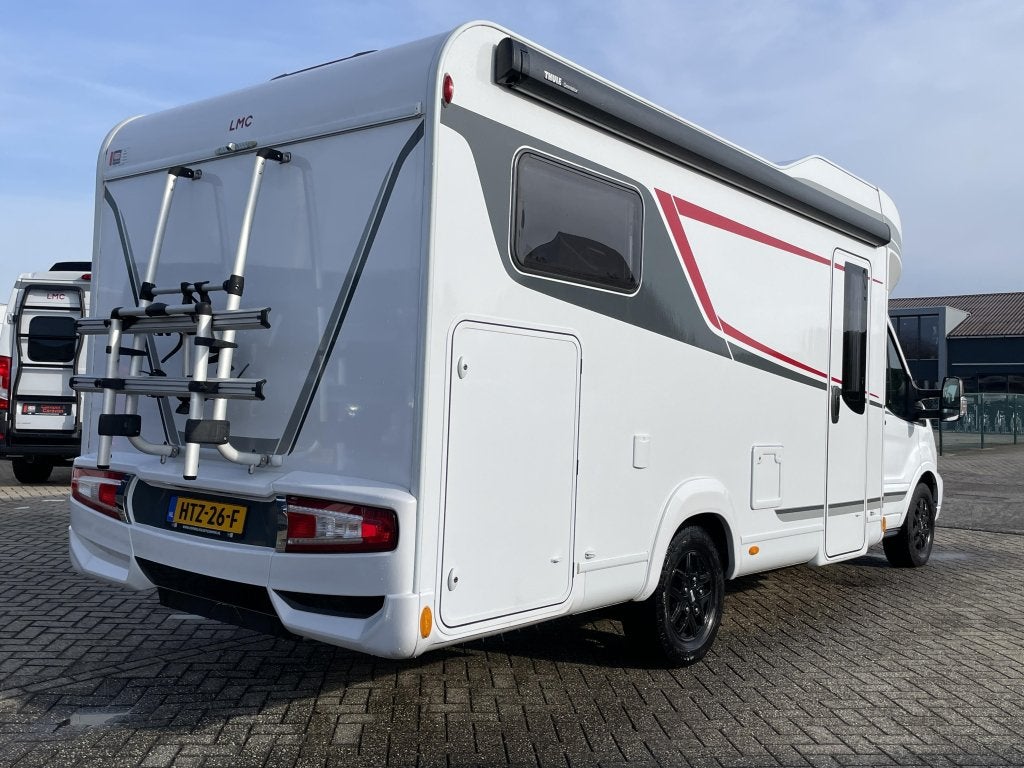 LMC Tourer Lift H 664 G AIRCO/FIETSENDRAGER/NAVI, Caravans en Kamperen, Campers, Automaat, Standaard zit, Ringverwarming, Luifel