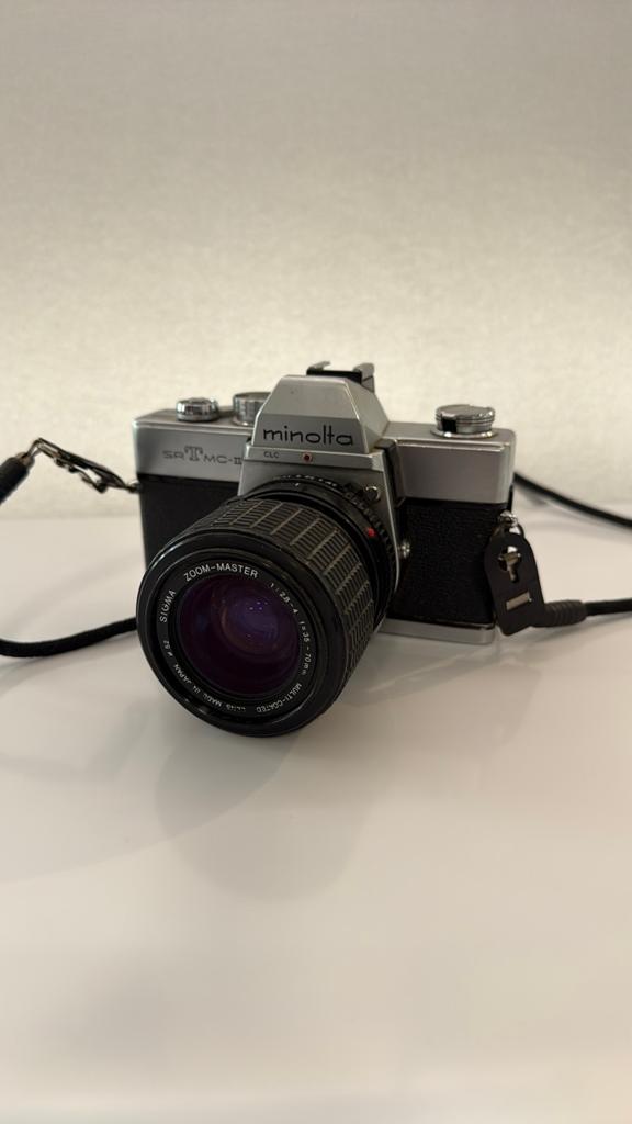 Minolta SRT MC-II met Sigma Zoom-Master 35-70mm lens, Audio, Tv en Foto, Fotocamera's Analoog, Ophalen of Verzenden, Gebruikt