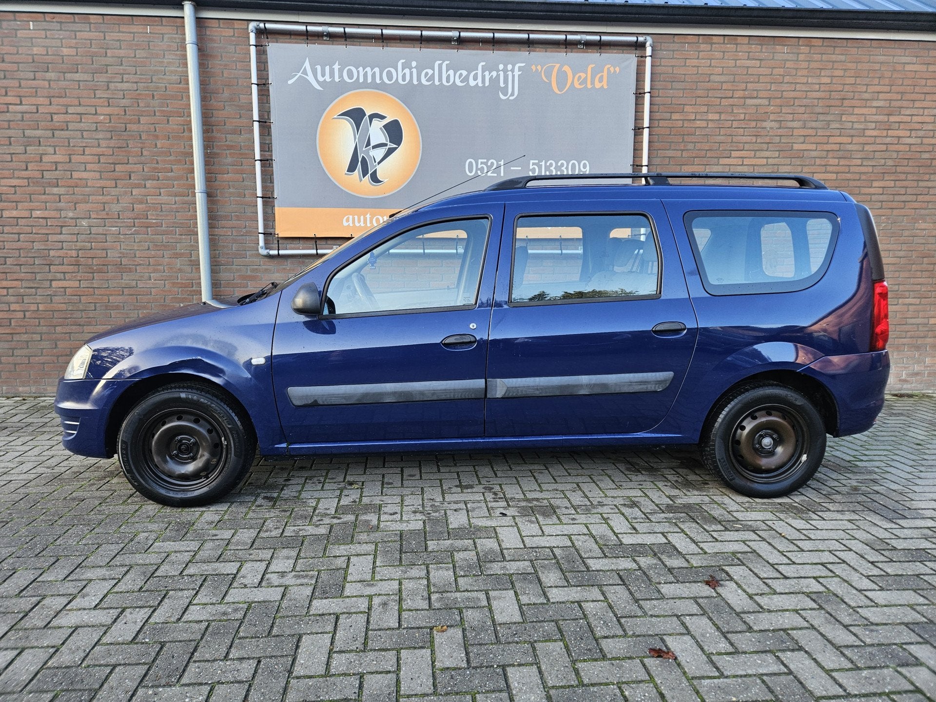 Dacia Logan MCV 1.4 Ambiance (bj 2009), Auto's, Stof, Gebruikt, 4 cilinders, Blauw