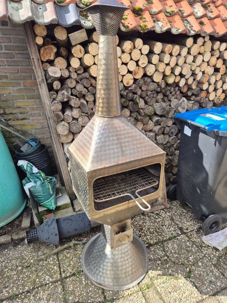 Buitenhaard met grillrooster, Ophalen