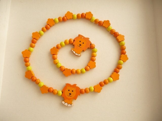 KINDERKETTING EN ARMBAND ORANJELEEUW EN BERENKETTING VINTAGE, Sieraden, Tassen en Uiterlijk, Kindersieraden, Verzenden, Zo goed als nieuw