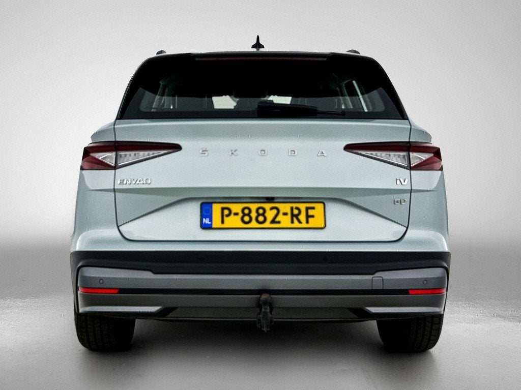 Skoda Enyaq iV 60 Trekhaak/Camera/verwarmbare voorstoelen, Automaat, Achterwielaandrijving, 179 pk, Leder en Stof