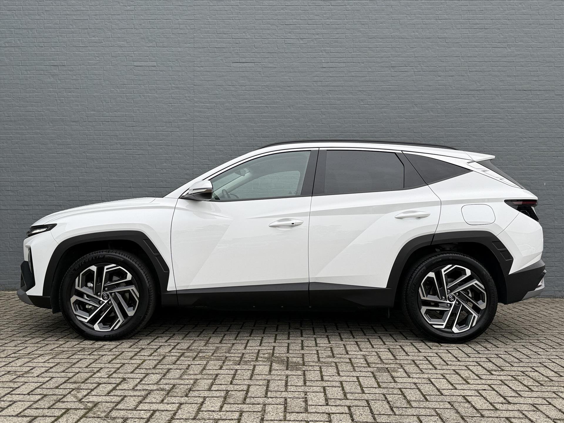 Hyundai Tucson New 1.6 T-GDi PHEV 252pk 2WD Aut Comfort Smar, Auto's, 4 cilinders, Wit, Bedrijf, Hybride Elektrisch/Benzine