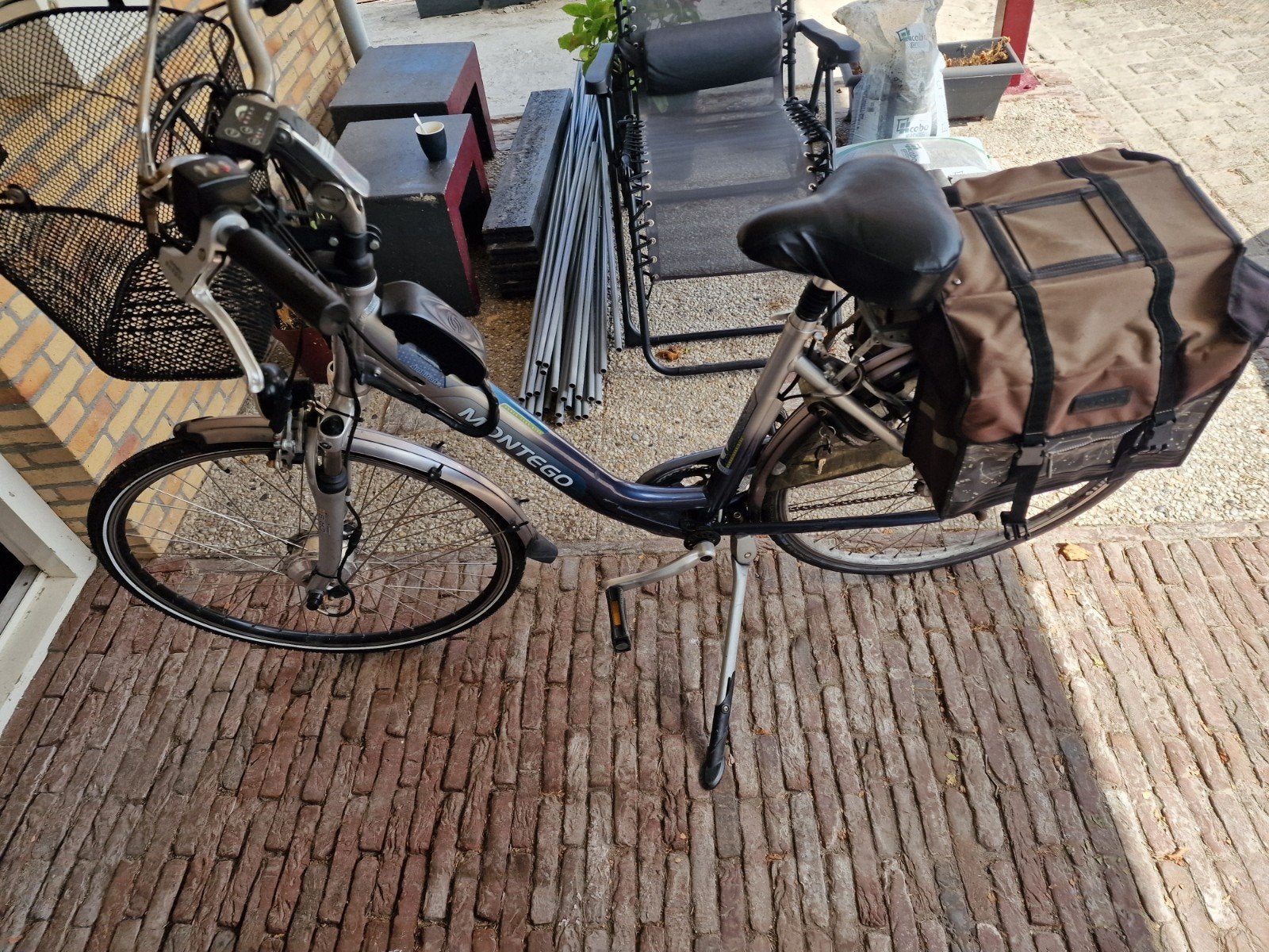 Montego elektrische fiets met fietstas, Ophalen, Gebruikt, 30 tot 50 km per accu, Overige merken