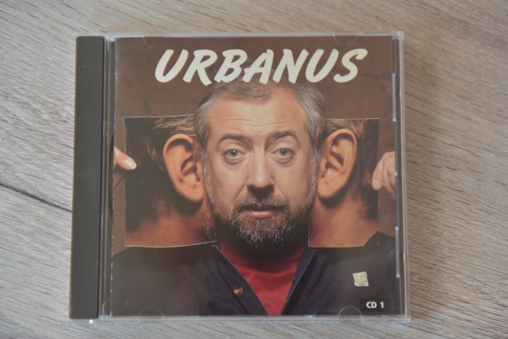 URBANUS -- THE BEST OF DEEL 1, Verzenden, Zo goed als nieuw, Verzamelalbum, Inclusief doosje