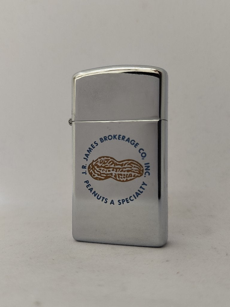 Zippo Slim James Brokerage CO - Peanuts - 1978, Ophalen of Verzenden, Zo goed als nieuw, Aansteker