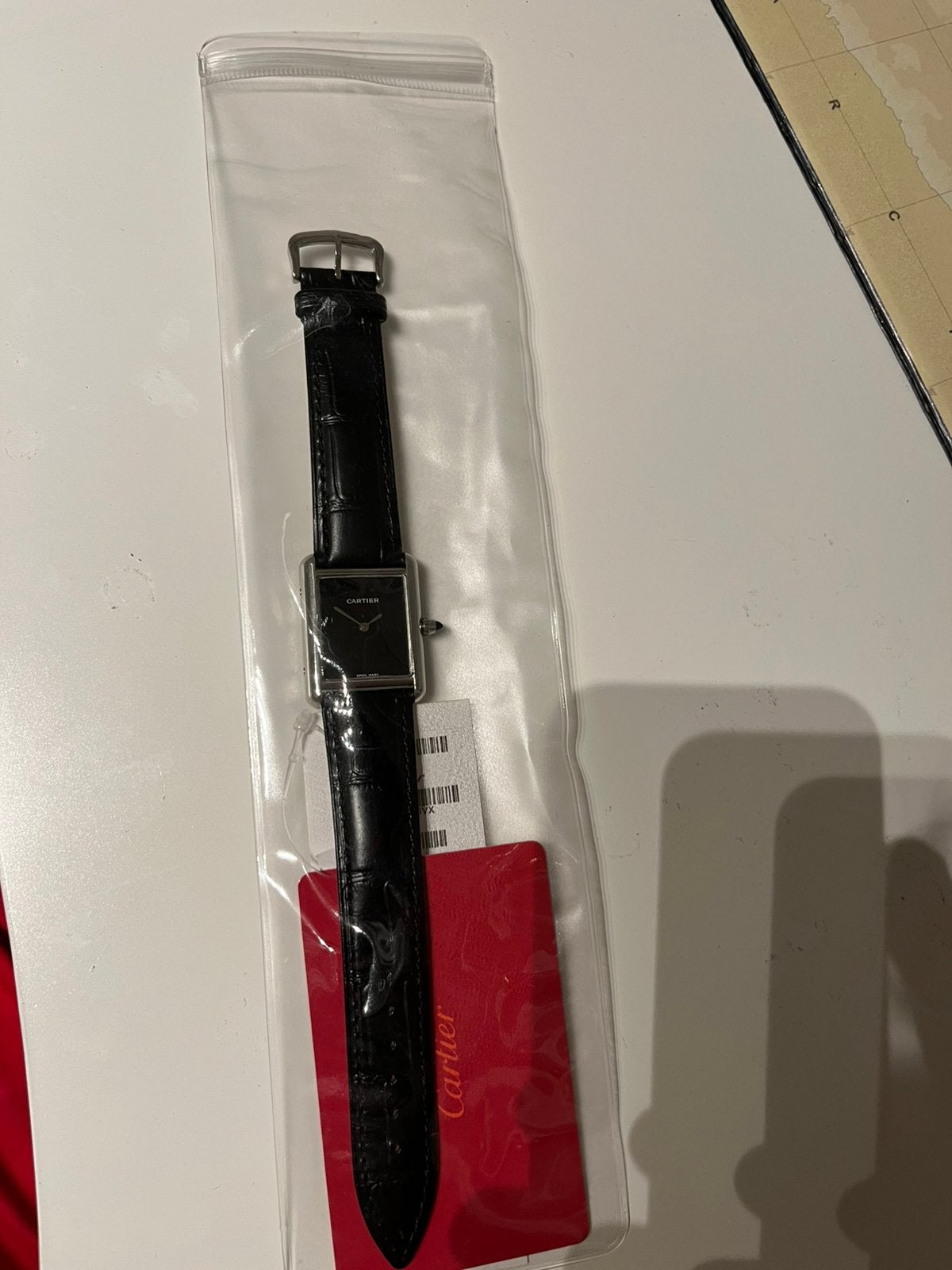 Cartier tank, Ophalen, Zo goed als nieuw