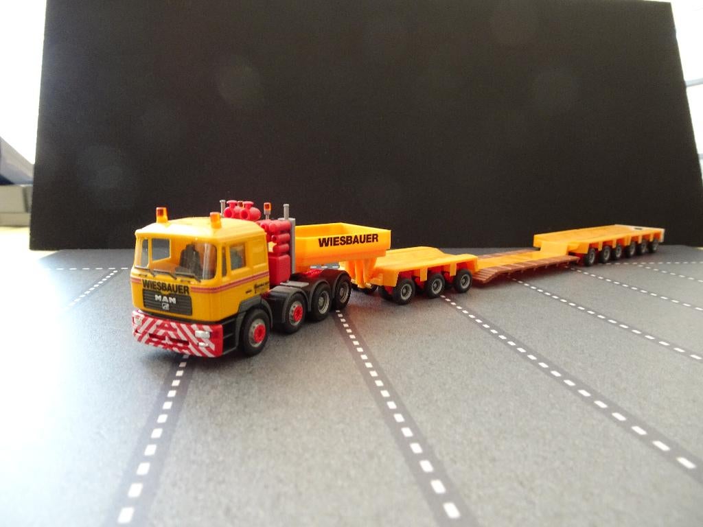 586 herpa man f90 wiesbauer goldhofer dieplader 1:87 truck, Hobby en Vrije tijd, Modelauto's | 1:87, Ophalen of Verzenden, Zo goed als nieuw
