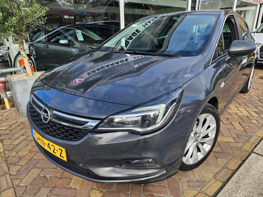 Opel Astra 1.4 Turbo innovation,leuke uitvoering,mooie kleur, Auto's, 125 pk, Gebruikt, Euro 6, 620 kg
