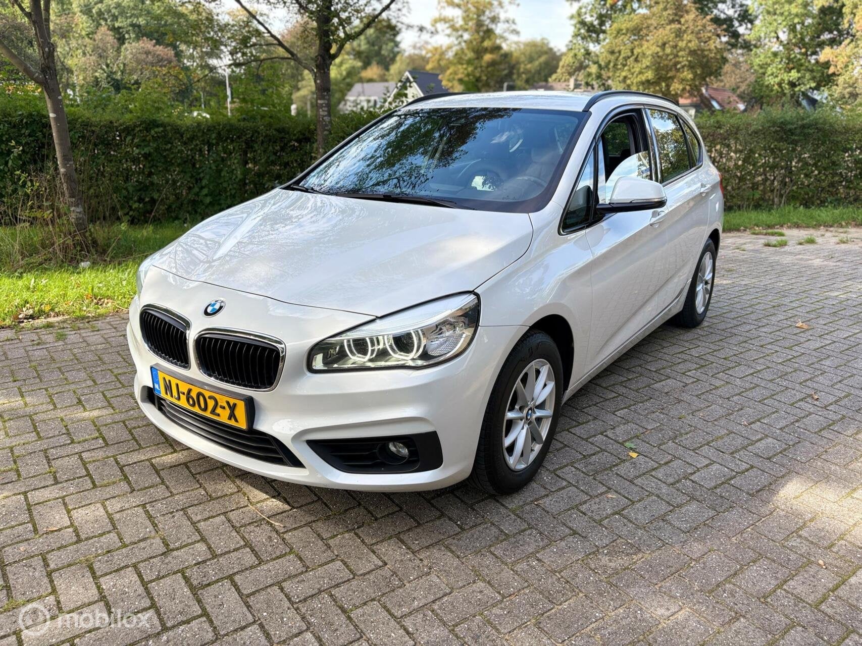 BMW 2-serie Active Tourer 218i High Executive | LEER | CLIMA, Auto's, Voorwielaandrijving, 136 pk, Gebruikt, Euro 6