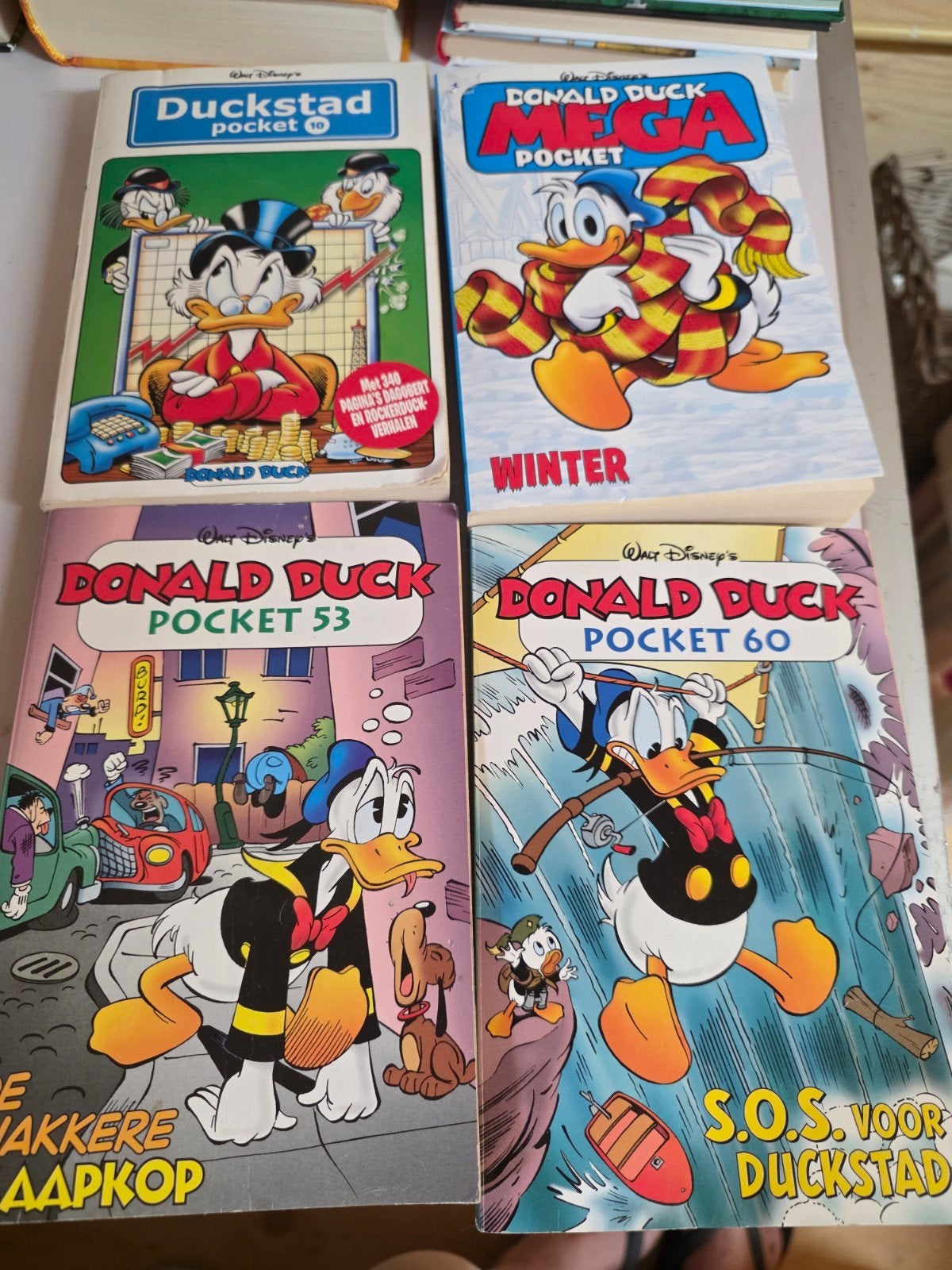 Donald Duck Pockets en Mega Pocket - 4 stripboeken, Ophalen of Verzenden