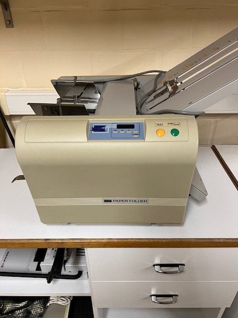papier vouwmachine, Ophalen