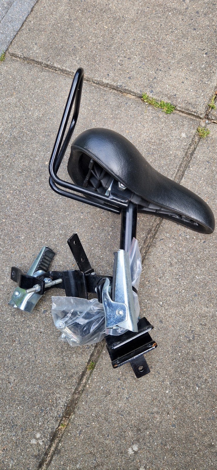 Zadelstoeltje voor voorop de fiets, Ophalen