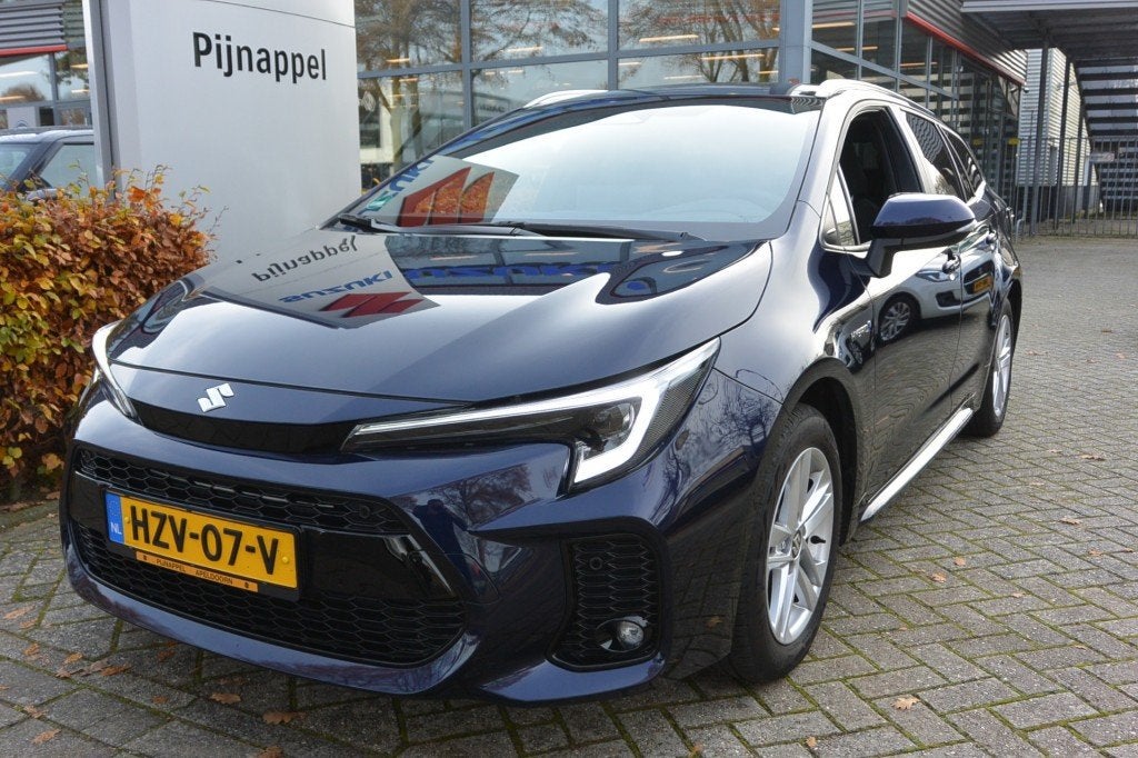 Suzuki SWACE 1.8 Hybrid Style AUTOMAAT, Auto's, 450 kg, 4 cilinders, Met garantie (alle), Blauw